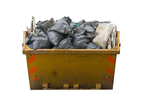 Customer service representative assisting with skip hire