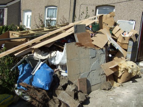 Workers sorting construction waste